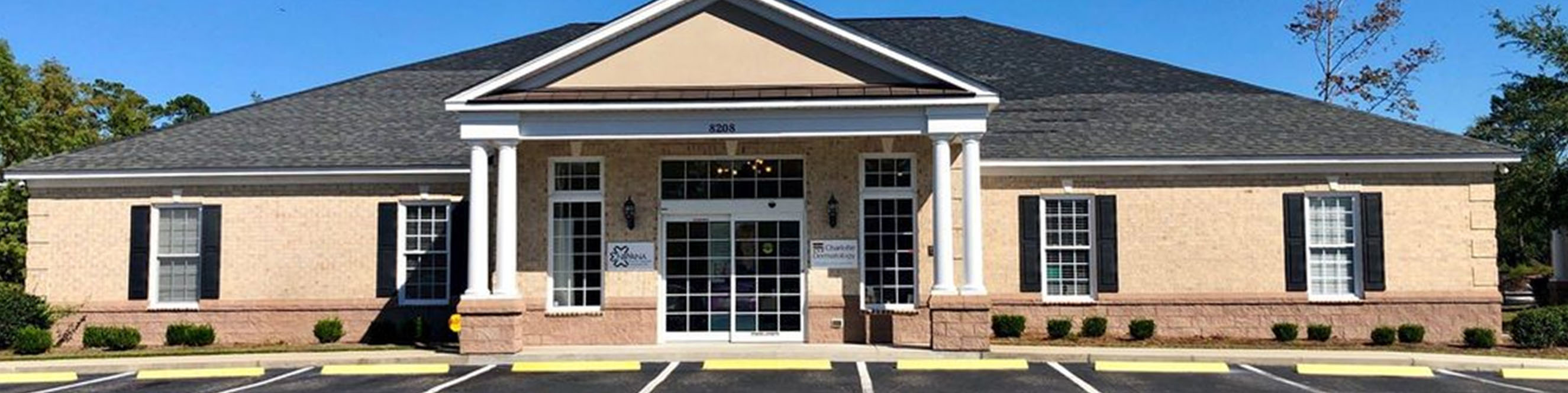 Exterior photo of the Myrtle Beach 8208 Devon Ct dermatology office, located near Grand Strand Regional Hospital with parking.